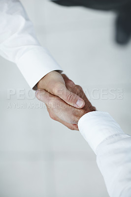 Buy stock photo Two businessmen shaking hands