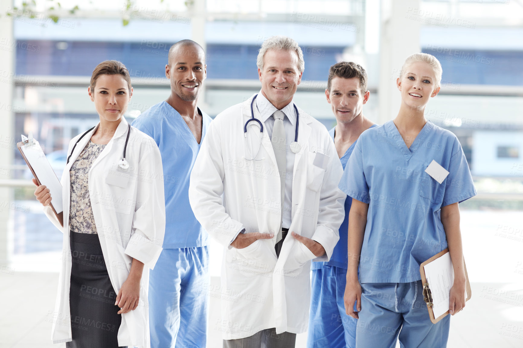Buy stock photo Team of medical professionals standing together