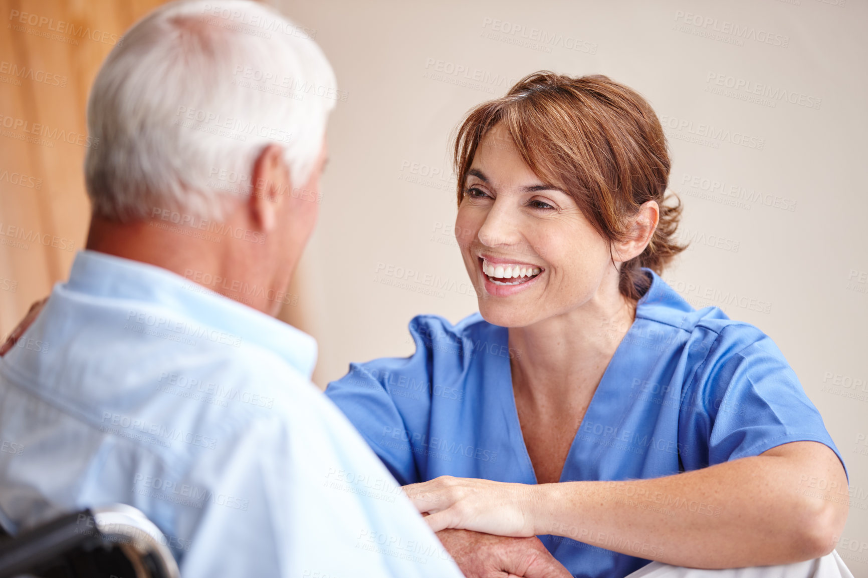 Buy stock photo Cropped shot of a female nurse checking on her senior patient