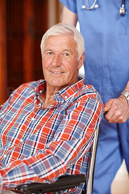 Buy stock photo Cropped shot of a senior man being pushed in a wheelchair by a nurse