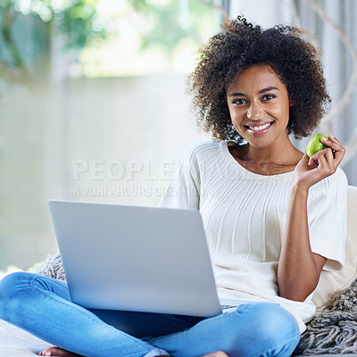 Buy stock photo Apple, typing and portrait of woman on sofa with laptop for social media, lifestyle blog and food website at home. Happy female person, technology or fruit for nutrition, healthy diet or clean eating