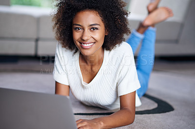 Buy stock photo Relax, laptop and portrait of woman on floor working on freelance creative project in living room. Happy, technology and African female designer typing on computer for research on rug in apartment.