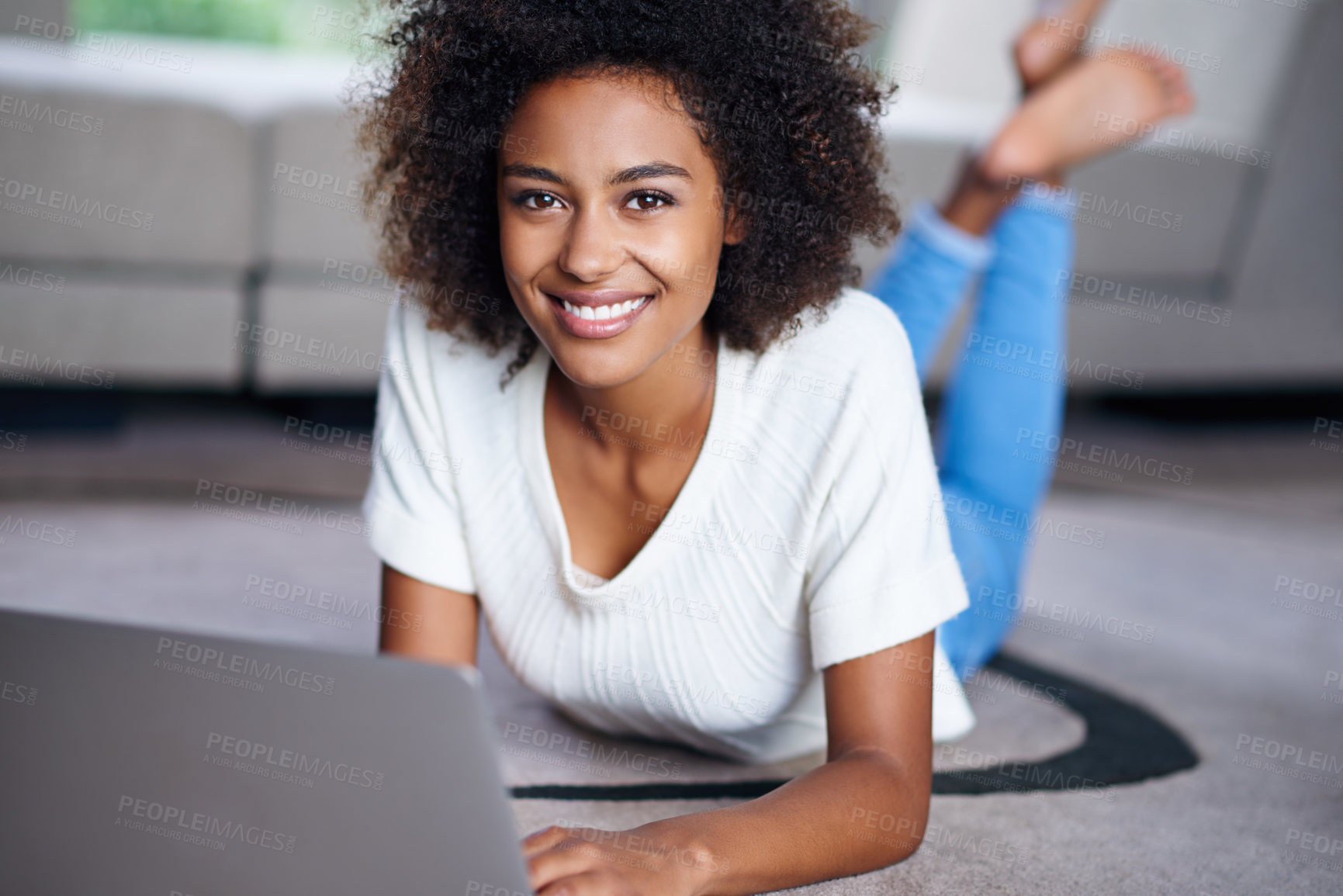 Buy stock photo Relax, laptop and portrait of woman on floor working on freelance creative project in living room. Happy, technology and African female designer typing on computer for research on rug in apartment.