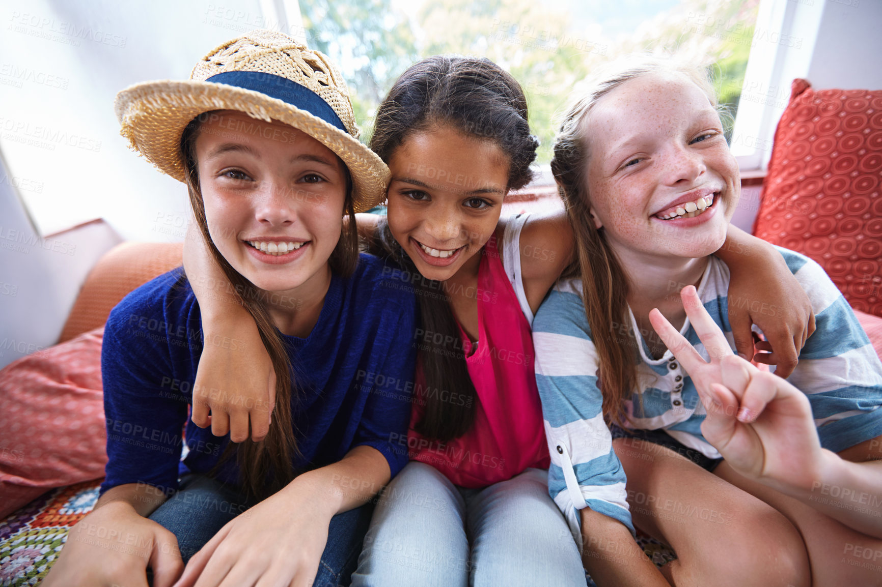 Buy stock photo Portrait of a group of teenage friends at home