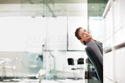 Buy stock photo Portrait of a young businesswoman leaning back in her seat