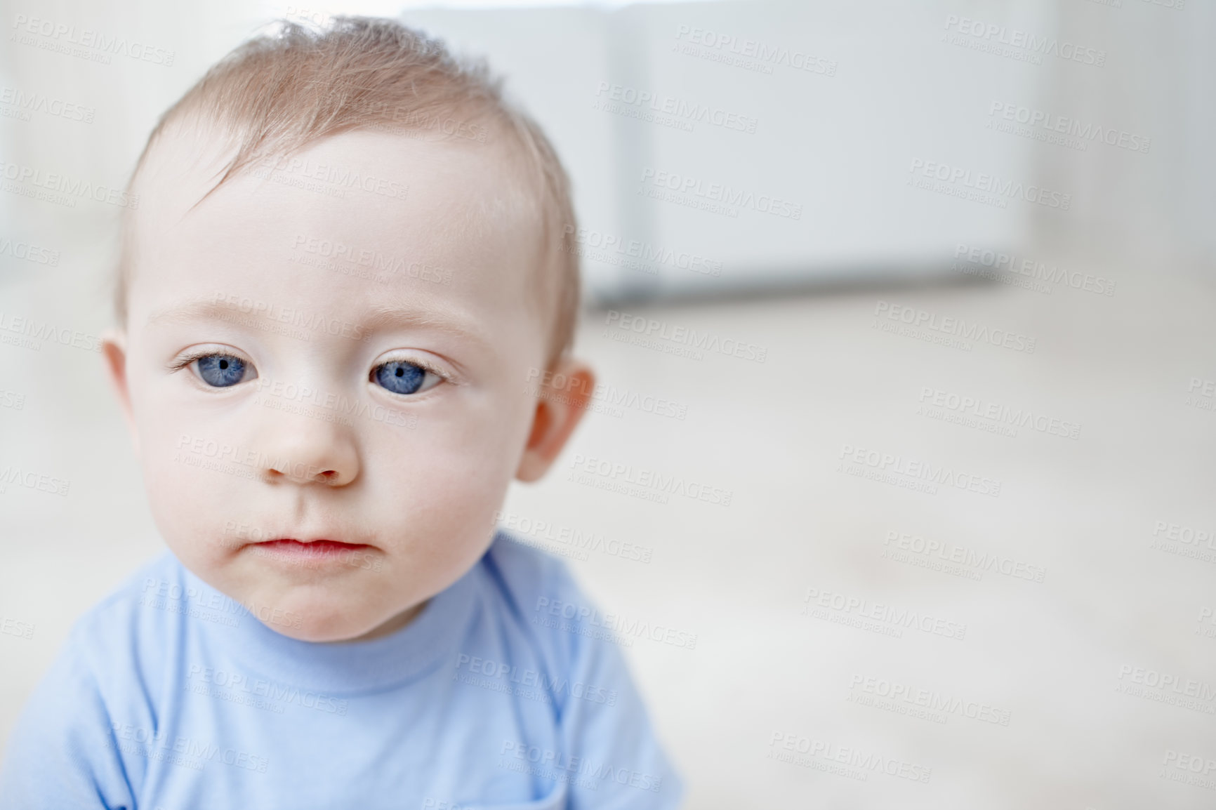 Buy stock photo An adorable little boy staring into space 