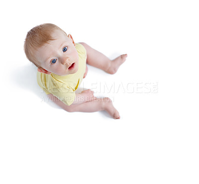 Buy stock photo High angle shot of a cute baby boy looking up