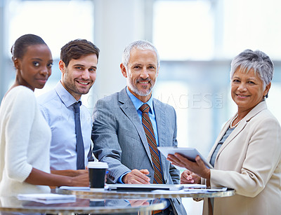 Buy stock photo Portrait of a group of diverse businesspeople having a meeting at the office