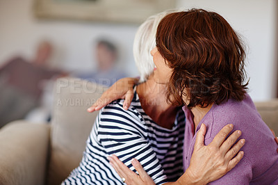 Buy stock photo Woman, grandmother and hug on sofa in home with family, care and parent love or smile. Happiness, retirement and adult with elderly mom, together or reunion, hello and embrace and living room