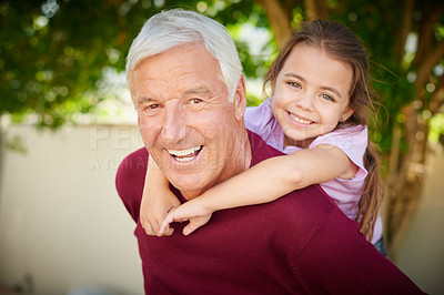 Buy stock photo Cropped portrait of a senior man bonding with his granddaughter