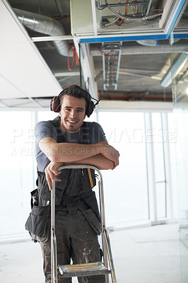 Buy stock photo Contractor, handyman and ladder with portrait of man in office for renovation, maintenance and repair. Project management, construction and industrial with person and building site for carpenter