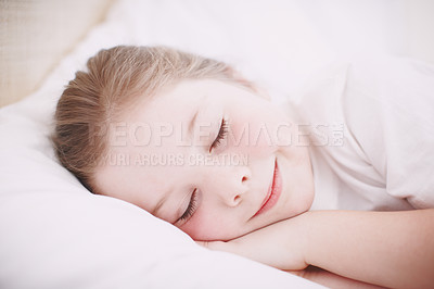 Buy stock photo Closeup shot of a young girl sleeping peacefully in her bed