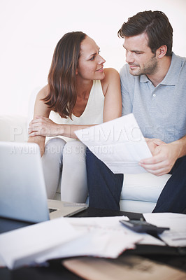 Buy stock photo A married couple doing some personal financial planning