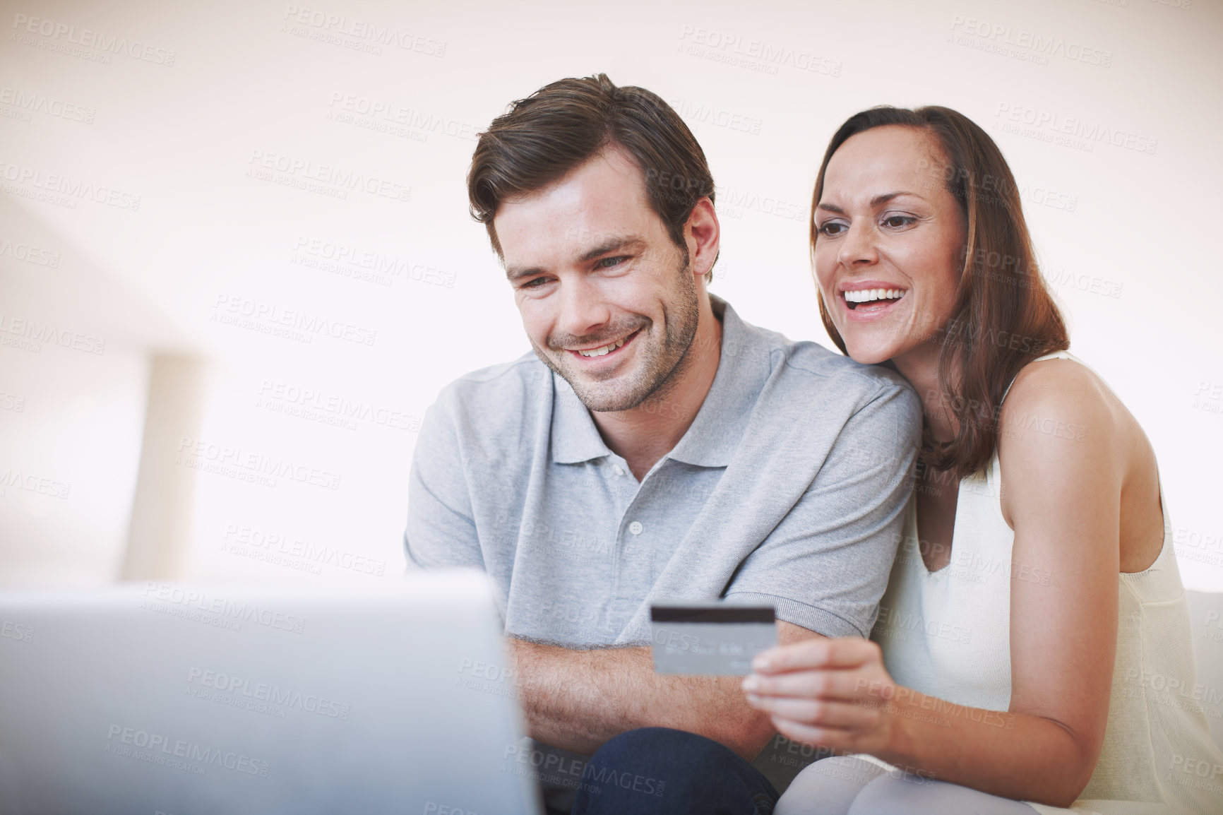 Buy stock photo A married couple doing their online banking together