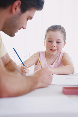 Buy stock photo Cropped shot of a little girl doing her homework
