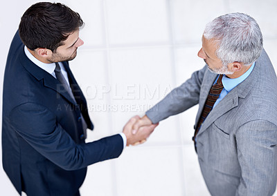 Buy stock photo Top view, business people and shaking hands with CEO for deal, collaboration or b2b partnership agreement for consultant. Above, introduction or handshake with men in office to welcome senior manager