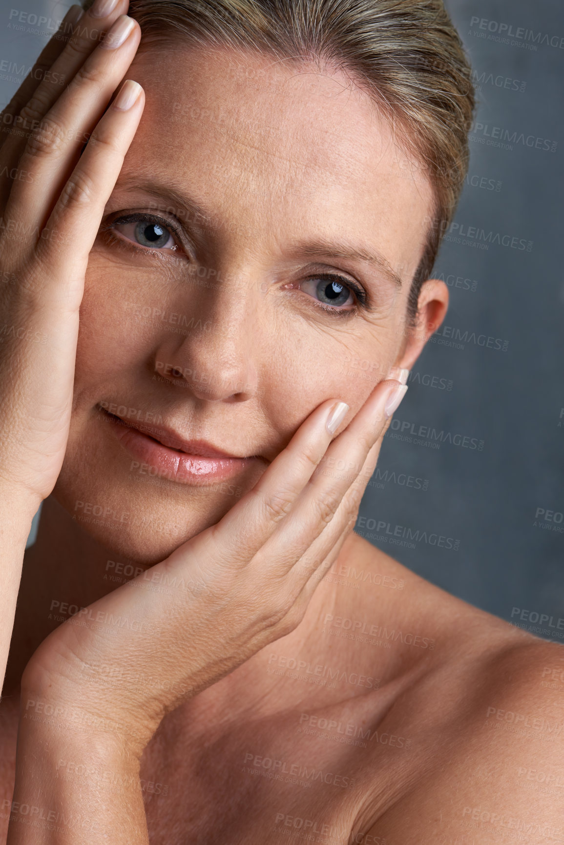 Buy stock photo Face, beauty and thinking with mature woman in studio on gray background for aesthetic wellness. Skincare, relax and hygiene with natural skin person at spa for antiaging cosmetics or treatment