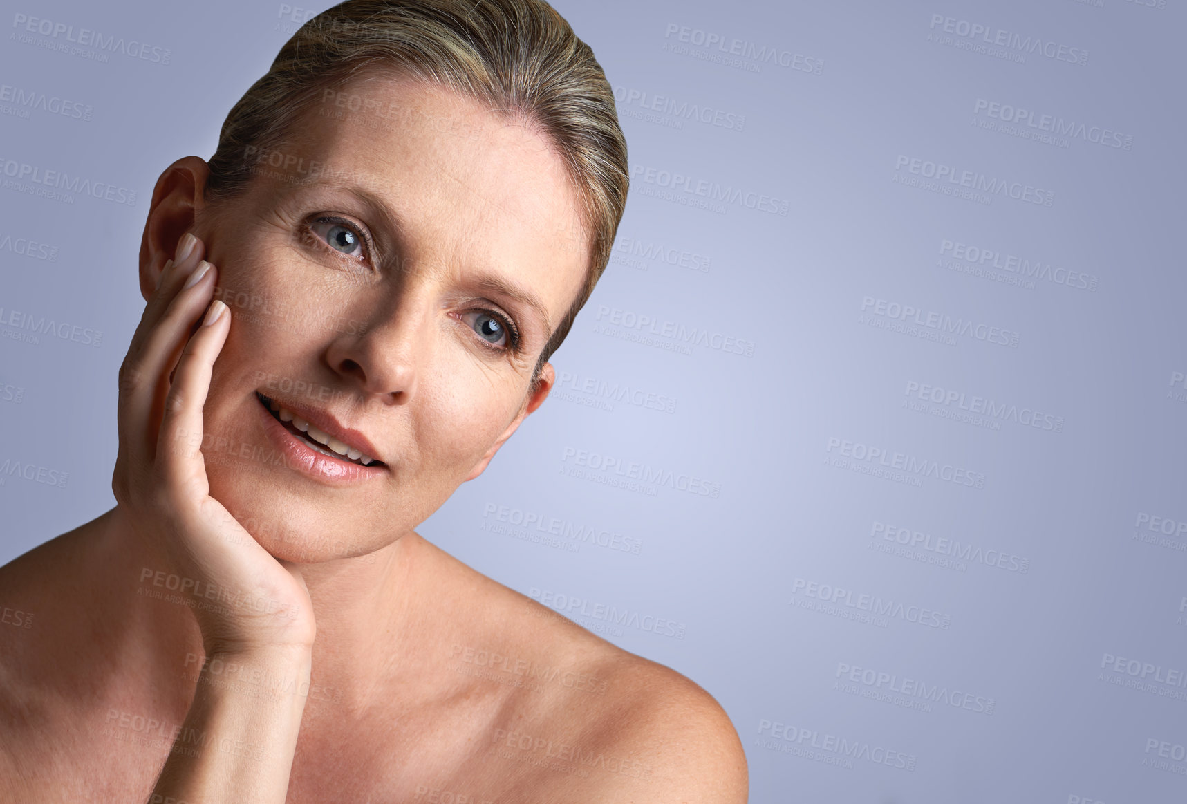 Buy stock photo Face, beauty and space with mature woman in studio on gray background for aesthetic wellness. Skincare, relax and mock up with natural skin person at spa for antiaging cosmetics or treatment