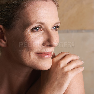 Buy stock photo Person, mature and smile with skincare, treatment and cosmetic for confidence. Senior, woman and proud with natural glow, satisfaction and elegance with happiness and self care in bathroom or home