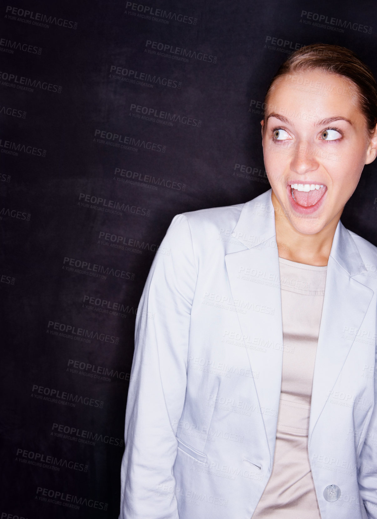 Buy stock photo Young business woman with mouth open isolated against black background