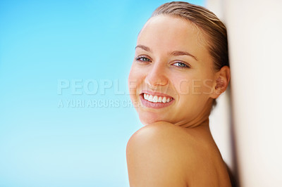Buy stock photo Woman, wall and skincare with portrait, smile or results for promotion, blue sky background or nature. Girl, skin glow and change with cosmetics, wellness or transformation for mockup space outdoor