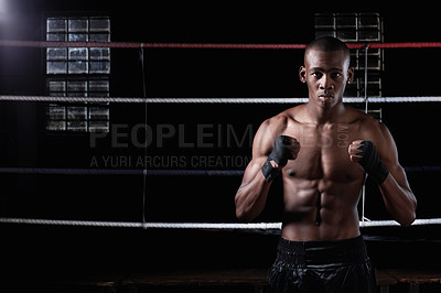 Buy stock photo Portrait of muscular African American male boxer standing in ring