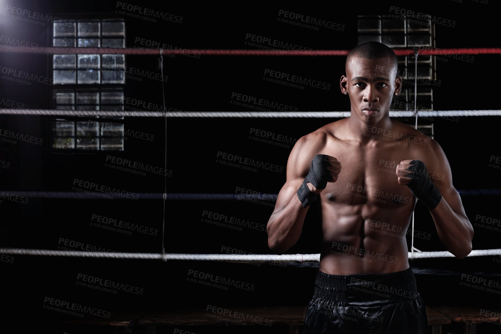 Buy stock photo Portrait of muscular African American male boxer standing in ring