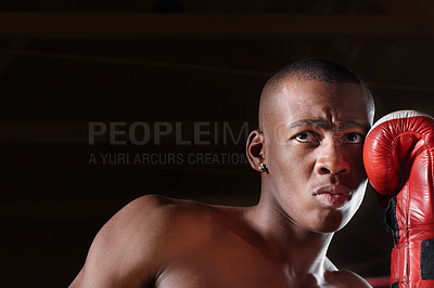 Buy stock photo Aggressive African American male boxer ready to punch
