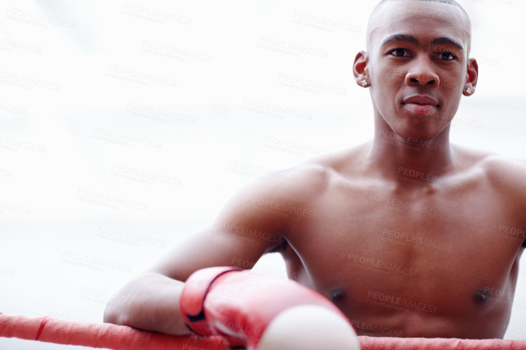 Buy stock photo Muscular African American man standing near ring