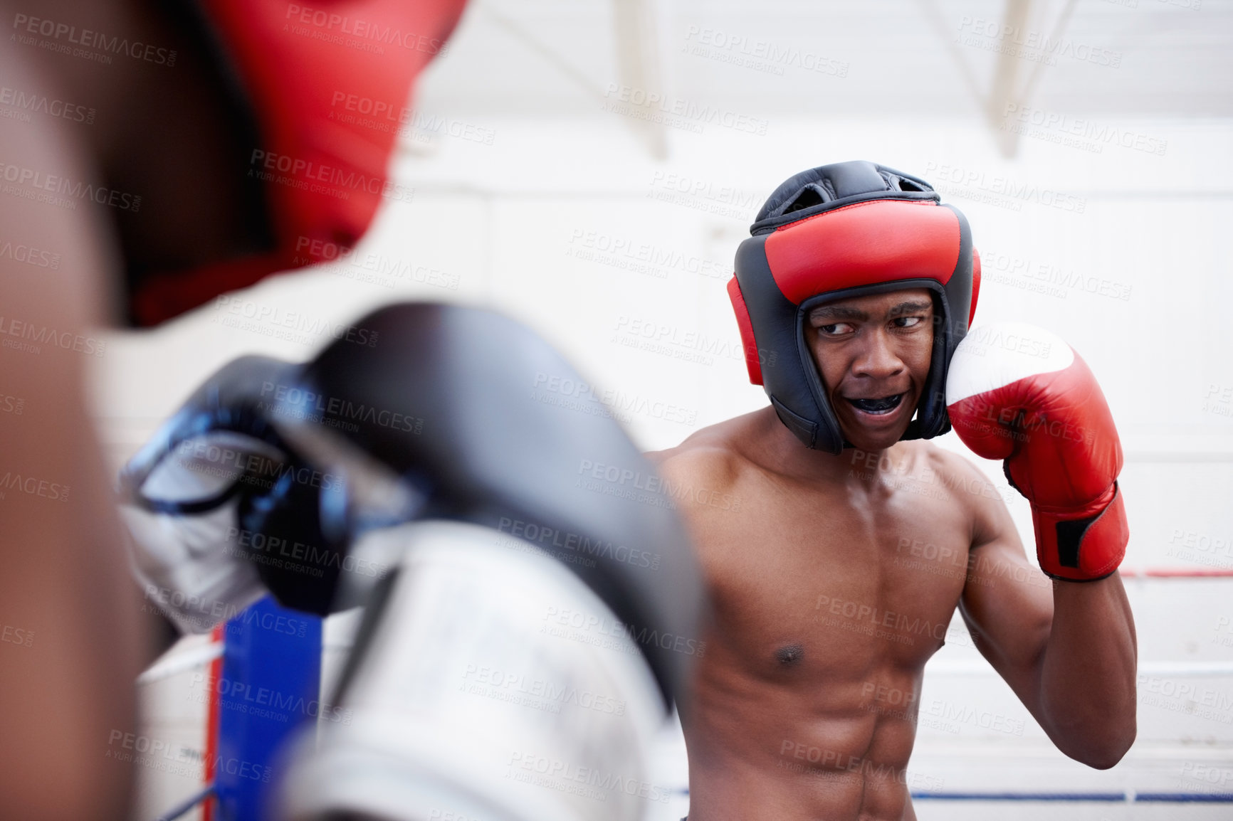 Buy stock photo Two African American muscular male athletics boxing