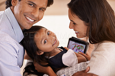 Buy stock photo Happy family, portrait and tablet with games for bonding, entertainment or enjoying weekend at home. Mother, father and daughter on technology for holiday, online app or interaction together at house