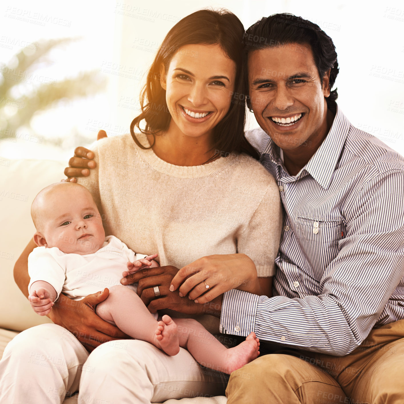 Buy stock photo Happy family, portrait and baby for support, love or care on holiday or bonding together at home. Father and mother smile with young little child, kid or newborn toddler on living room couch at house