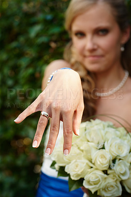 Buy stock photo Cropped shot of a young bride showing off her wedding ring