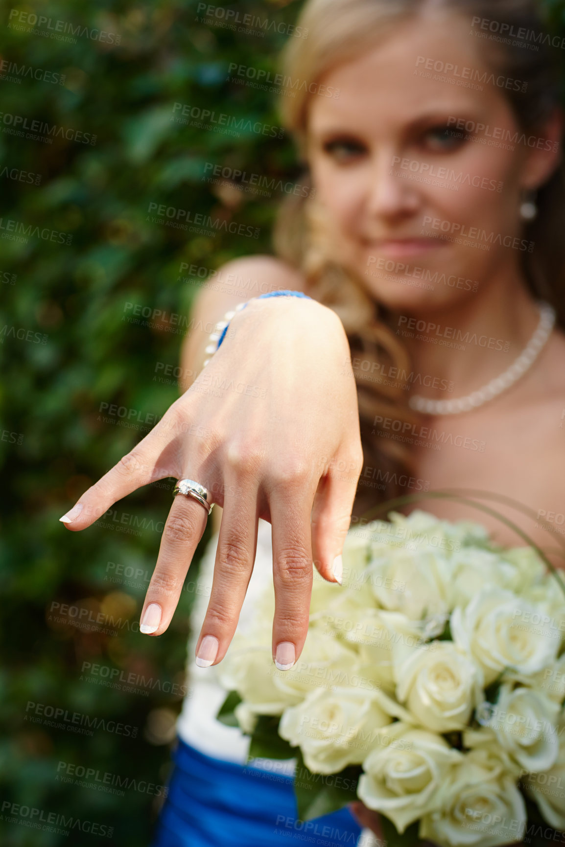 Buy stock photo Cropped shot of a young bride showing off her wedding ring