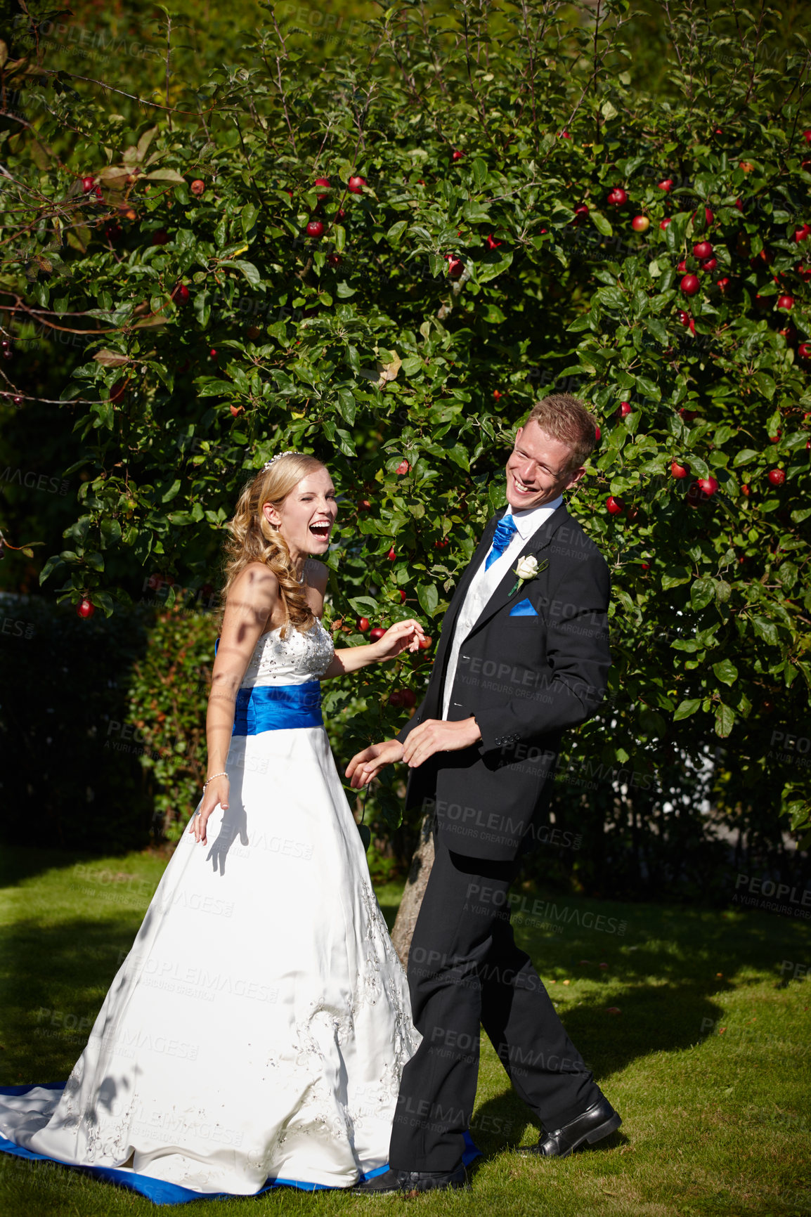 Buy stock photo Full length shot of a bride and groom on their wedding day