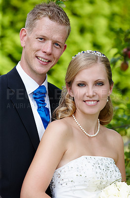 Buy stock photo Cropped portrait of a bride and groom on their wedding day