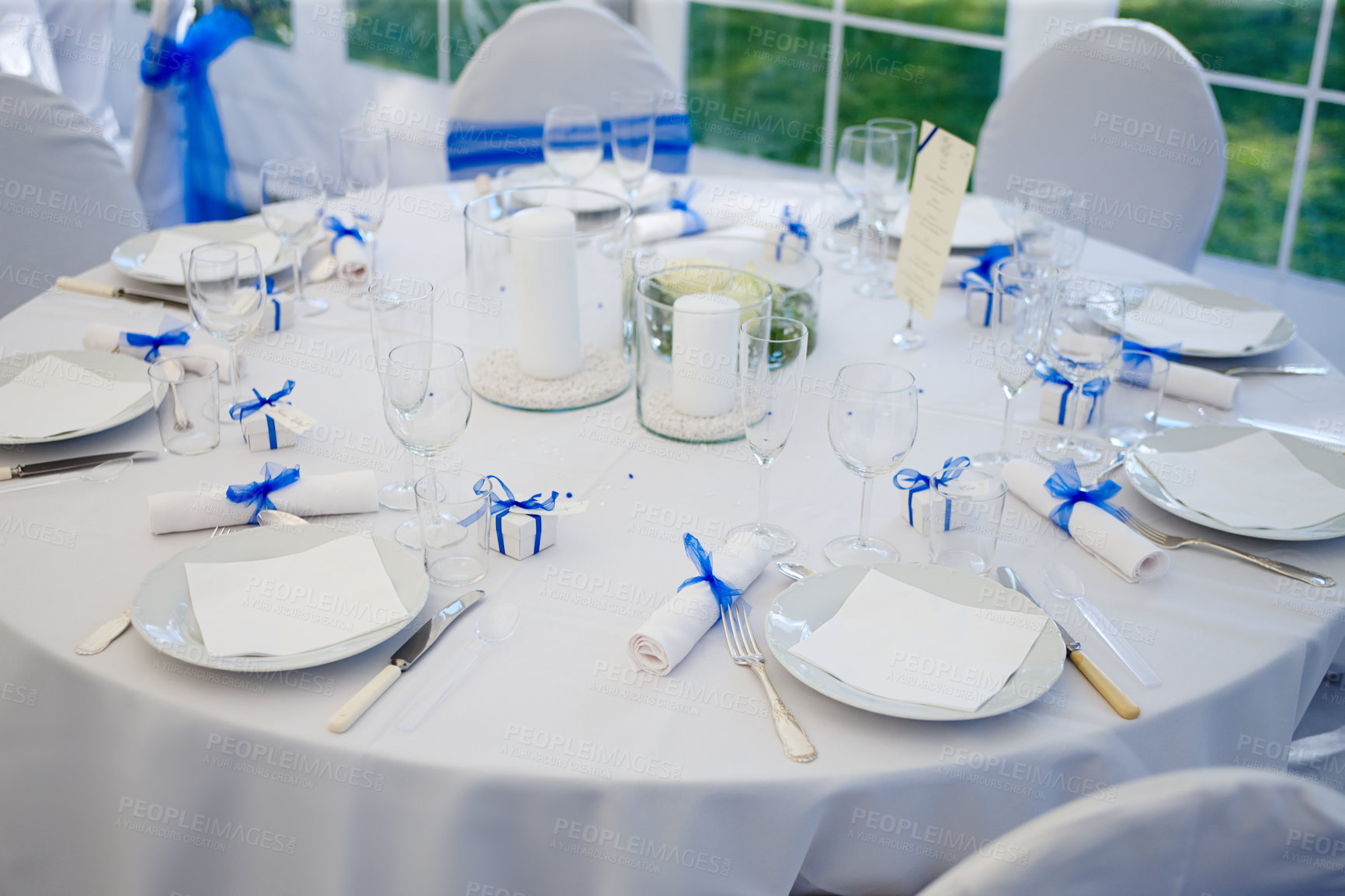 Buy stock photo Shot of plates arranged on a table at a wedding reception