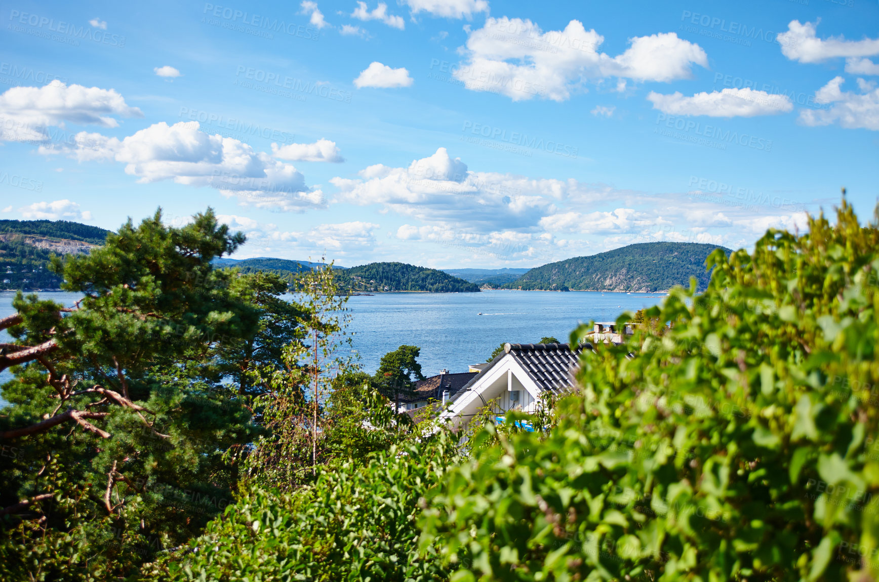 Buy stock photo Cropped shot of a house near a body of water