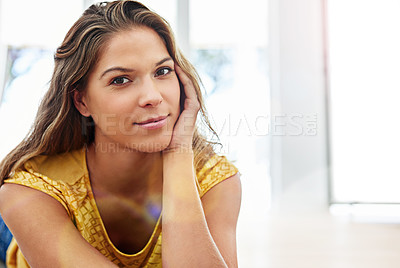 Buy stock photo Woman, relax and portrait on floor in home for lying, confidence or casual with pride in morning at apartment. Person, happy and comfortable with lens flare in living room at modern house in Portugal