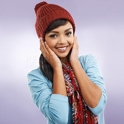 Buy stock photo Portrait, happy and woman in winter fashion isolated on purple studio background. Face, smile and young model in warm scarf, clothes and student with stylish beanie for cold weather in Argentina