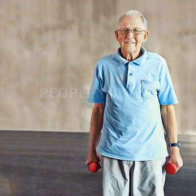 Buy stock photo Portrait of a senior man holding weights