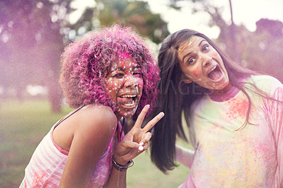 Buy stock photo Color, festival and friends with peace sign for fun, splash and outdoor social gathering for spring, nature and smile. Powder, paint and celebration in park with excited women at happy event together