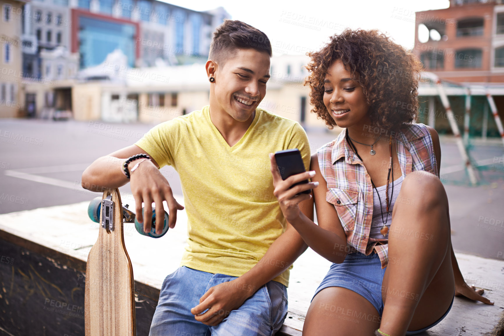 Buy stock photo Skating, phone and couple with skateboard in city for exercise, training and sports hobby in town. Skate park, fashion and man and woman on smartphone for social media, networking and online chat