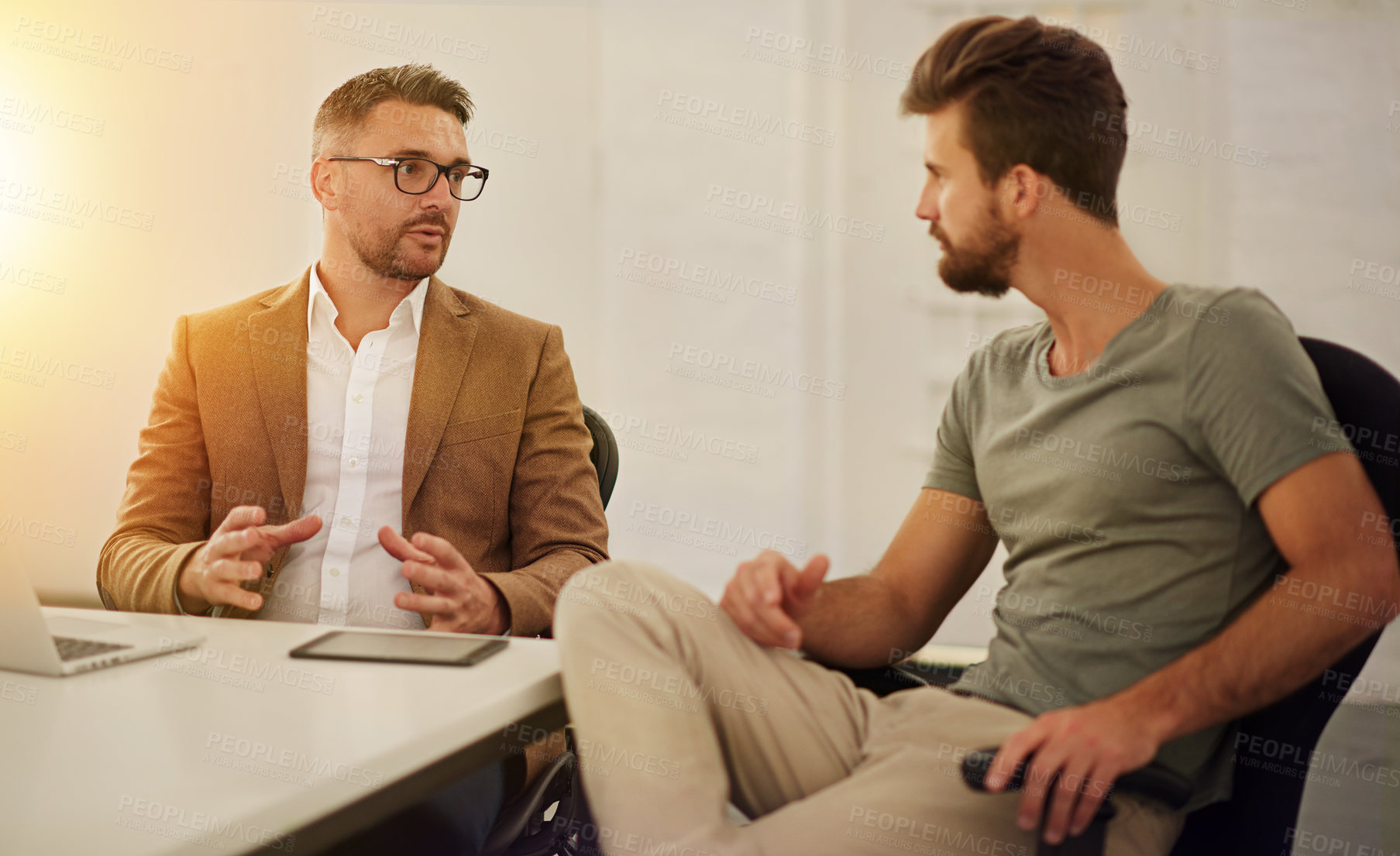 Buy stock photo Cropped shot of two businessmen in the boardroom