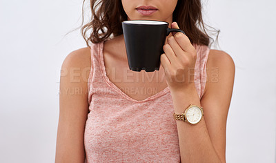Buy stock photo Cropped shot of a woman's hands holding a cup of coffee
