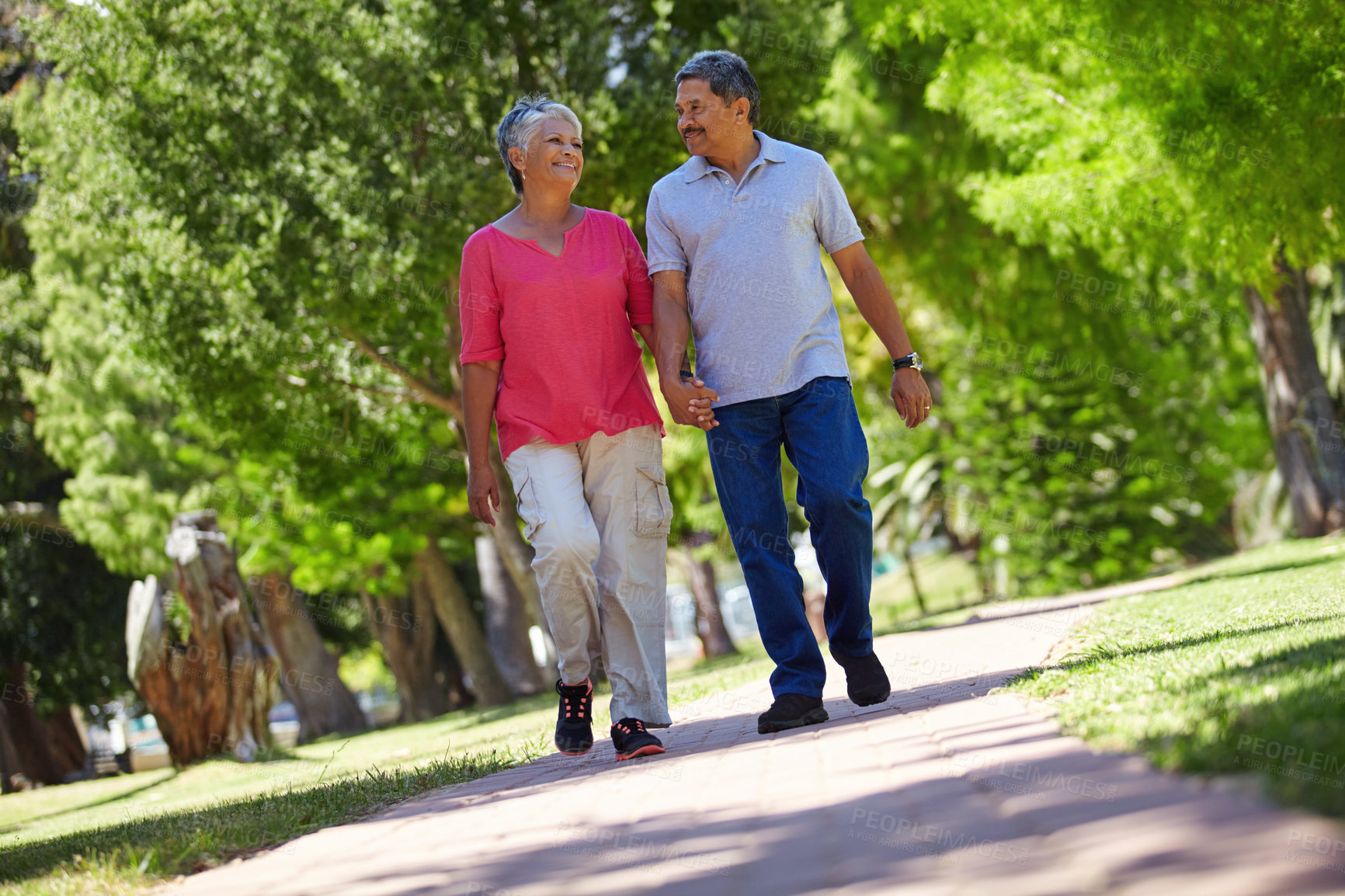 Buy stock photo Shot of a loving senior couple enjoying quality time together outdoors