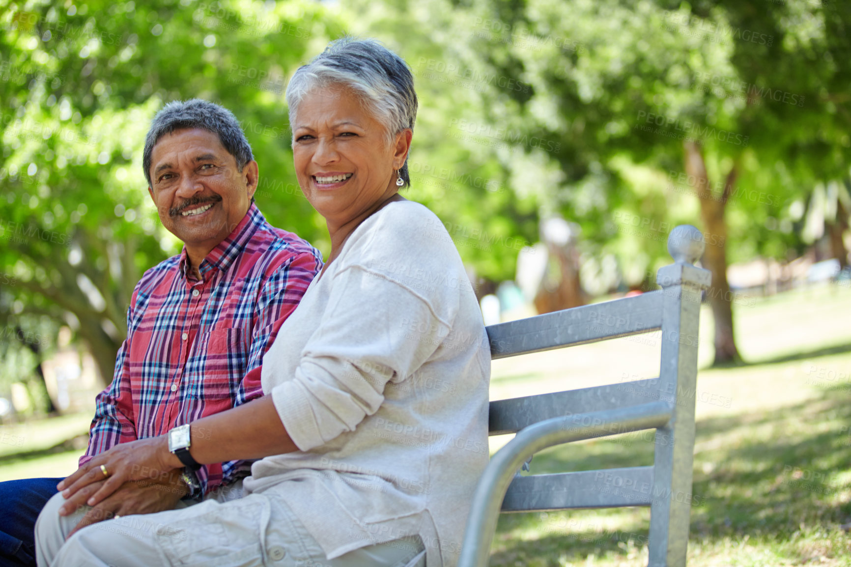 Buy stock photo Shot of a loving senior couple enjoying quality time together outdoors