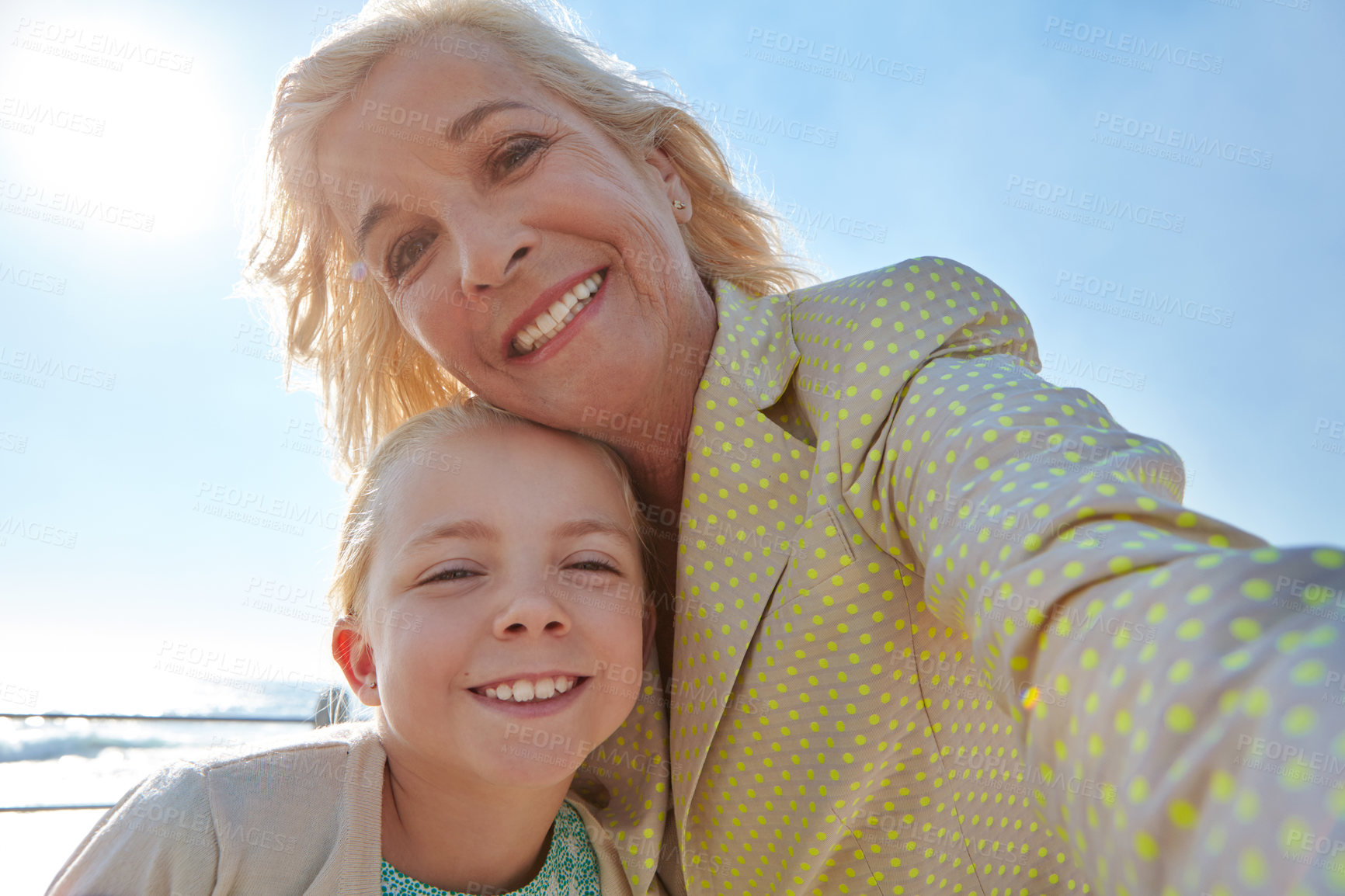 Buy stock photo Shot of a grandmother and her granddaughter spending some time outdoors