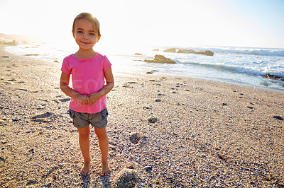 Buy stock photo Shot of an adorable little girl on the beach