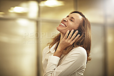 Buy stock photo Cropped shot of a businesswoman laughing while talking on her cellphone